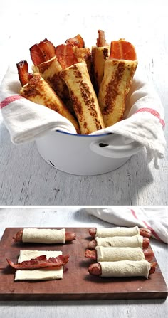 a white bowl filled with french fries on top of a wooden table next to a towel