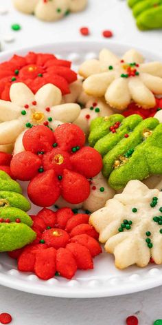 There’s nothing more nostalgic or festive than a platter of freshly decorated homemade Spritz Cookies! These buttery, tender cookies are some of my favorites around the holidays, and I love getting the whole family in on the process. The simple dough is shaped using a cookie press and then topped with colorful sprinkles and a sweet lemon glaze. My Christmas cookie platter isn’t complete without these little gems! Gluten Free Spritz Cookies Recipe, Gluten Free Spritz Cookies, Buttery Spritz Cookies, Gluten Free Holiday Cookies, Spritz Cookie Recipe, Gluten Free Christmas Cookies, Dairy Free Baking, Gluten Free Holiday, Easy Christmas Cookie Recipes