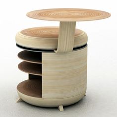 a wooden table with three sections stacked on top of each other and one section open