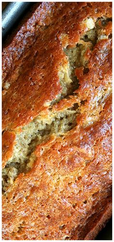 a loaf of banana bread sitting on top of a pan