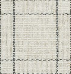 a checkered rug with black and white squares on the bottom, in neutral colors