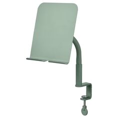 a green wall mounted toilet seat with the arm extended to it's left side