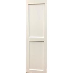 a white door on the side of a wall with an open top and bottom panel