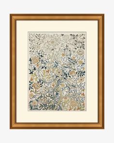 an ornate painting with flowers and leaves in gold frame on a white wall behind it