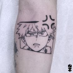 a man's arm with an anime character tattoo on it