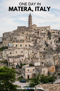 an old town with the words one day in mater, italy on it's side