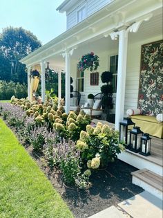 porch ideas porch aesthetic summer house ideas porch ideas How To Landscape Front Of House, Hydrangea Landscaping Colonial House, Southern Landscaping Ideas Front Yard, Front Porch Hydrangea Landscaping, Hydrangea Landscaping Ranch House, Hydrangeas In Front Of House Porches, French Country Flower Beds, East Coast Landscaping Ideas