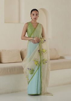 In the serene hue of seafoam, the Adore Jamdani saree is a testament to beauty in simplicity. Handwoven from the finest organza mulberry silk, its texture is as enchanting as its color, draping you in artistry. The allure unfolds on the contrasting beige organza pallu, adorned with delicate floral jamdani bunches.Jamda Cocktail Saree, Sari Dress, Saree For Women, Dress Embroidery, Jamdani Saree, Black Saree, Saree Trends, Indian Saree