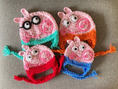 three crocheted peppa pig hats on top of each other