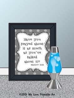 a blue and white vase sitting next to a framed print with the words have you proved about it as much as you've talked about it?