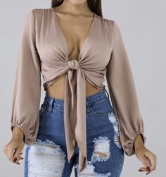 This top is perfect for your girls night, date, night, happy hour. It features a cozy stretch satin material with a ruffled elasticized end sleeve. Wear this with your perfect Jeans and make an effortless aappearance