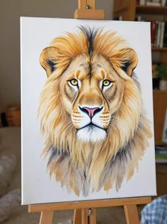a painting of a lion on an easel