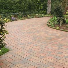 Traditional Block Paving The Chartres range of block paving has been designed to provide a traditional, olden style look and feel that works well with period and rustic properties. When laid, these blocks provide a paved surface that looks established and in keeping with traditional and period surroundings. Kerbside Appeal Chartres Paving Blocks provide a beautiful paved surface, ideal for driveways, footpaths and patio areas in your garden. The aesthetic quality of these blocks will certainly add to the looks of your property. A beautiful driveway can add up to 10% to the value of your home, so Chartres blocks are a great way to maximise this potential.  Driveway Paving Chartres Block Paving has been created to specifically meet the needs of domestic driveways and parking areas. The block Large Driveway Ideas, Block Paving Patio, Concrete Block Paving, Entrance Landscaping, Driveway Blocks, Beautiful Driveways, Driveway Entrance Landscaping, Paving Ideas, Driveway Paving