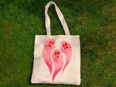 "Cute tote bag for the halloween girlies. - Made with 100% cotton sheeting - Reinforced handle stitched into bag! - Practical and durable - A reliable and stylish way to carry your belongings!  Material: 100% cotton  - Lightweight and compact  - Handle Length: 21.5\"  - One size only Height: 15.75 inches Width: 15.25 inches Handle Length: 21.5 inches" Diy Halloween Tote Bag, Fun Pink Cotton Bag, Fun Cotton Tote Canvas Bag, Ghost Tote Bag, Ghost Diy