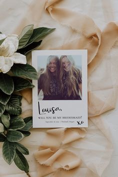 two women with long hair and flowers on top of a sheet of paper next to each other