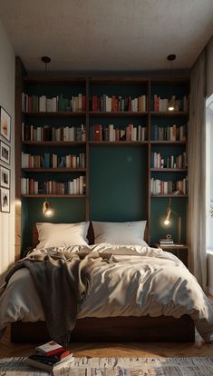 a bed sitting in front of a book shelf filled with books