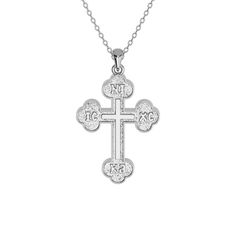 Drape your spirituality in elegance with the Greek Orthodox Two-Sided Pavé Cross Necklace. This exquisite piece features a double-sided design with a Greek Orthodox cross on one side, and sparkling pavé set stones of your choice on the other. Available in solid gold or sterling silver, it's a profound statement of faith that's visually striking from every perspective. Greek Orthodox Cross, Orthodox Cross Necklace, Arabic Jewelry, Orthodox Cross, Sterling Silver Cross Necklace, Turquoise Bead Necklaces, Greek Jewelry, Greek Orthodox, Evil Eye Jewelry