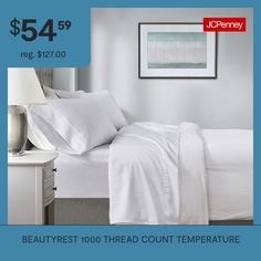 a bed with white sheets and pillows on it for $ 54 99 reg $ 72 00