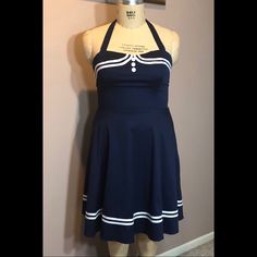 Nwt Women’s Navy Blue Dress With White Trim. Side Zip And Halter Tie At Neck. Retro Navy Dress For Spring, Blue Nautical Spring Dresses, Fitted Cotton Nautical Dress, Blue Nautical Dress For Summer, Blue Nautical Summer Dress, Navy Retro Summer Dress, Sailor Style Blue Summer Dresses, Blue Sailor Style Summer Dresses, Blue Sailor Summer Dresses