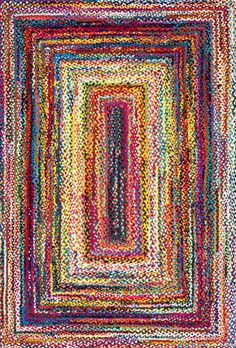 a multicolored square rug with many different colors