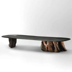 a wooden bench made out of logs on a white background with no one around it