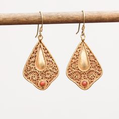 Coral set on filigree work 24k vermeil earrings Approximate dimensions; L 1.65 X W 0.75 Inches Ornate Gold Plated Dangle Earrings, Minimalist Feminine Style, Pointed Nails, Filigree Jewelry, Jewelry Minimalist, Handmade Artisan, Feminine Style, Emerald, Dangle Earrings