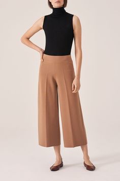 Our best selling culotte pant. Its relaxed fit and flare create a stylish and comfortable look. WMEP8F9 - 100% superfine merino wool- Model is 5'10" and wearing size S- Worn with black cashmere skin sleeveless turtleneck-WC904F9 Sleeveless Turtleneck Outfit, Culotte Outfit, Sketch Digital Art, Culottes Outfit, Culottes Pants, Sketch Digital, Turtleneck Outfit, Solo Costume, Fashion Basics