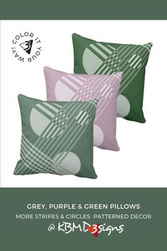 three pillows with green and pink designs on them