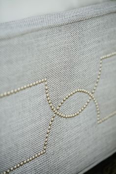 a close up view of the stitching on a pillow