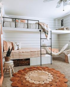 a bedroom with bunk beds and hammock chairs