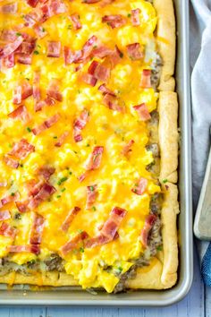 a casserole dish with ham and cheese on top, ready to be eaten