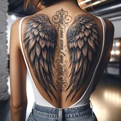 the back of a woman's body with wings on her upper and lower back