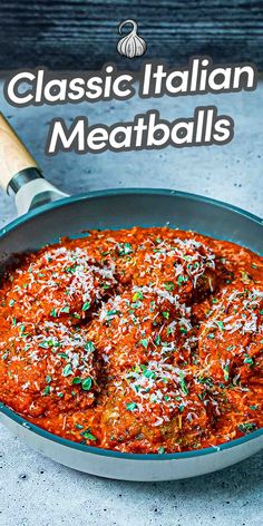 a skillet filled with meatballs covered in sauce and sprinkled with parmesan cheese