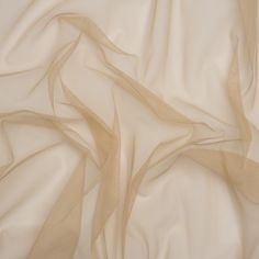 the fabric is white and beige with some thin lines on it's surface,