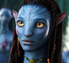 a woman with blue skin and yellow eyes is surrounded by other women in avatars