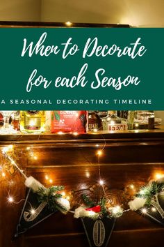 a fireplace with christmas lights and garlands on it that says when to decorate for each season