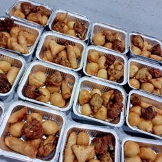 many plastic containers filled with food on top of a table