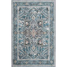 a blue rug with an ornate design on the front and back side, in various colors