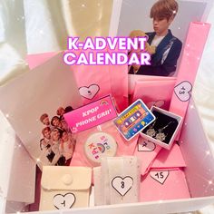 the k - advert calendar has been placed in a pink box with pictures on it