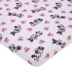 a pink and black minnie mouse sheet with polka dots