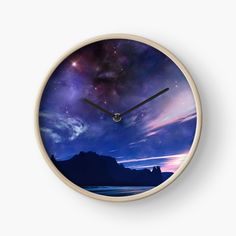 a clock with an image of the night sky