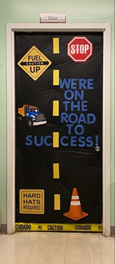 there is a sign on the door that says we're on the road to success