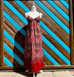 Beautiful and summery vintage 00s Gap dress! Most of my vintage items here in my shop (and closet) are flea market finds...this is not. I loved this dress so much that I bought it in the early 00s in both red and blue. I have no been able to fit into this dress in years and years, I donated the blue one years ago, but I couldn't let this dress go. But I will also never be a size 4 again. So, I hope that this dress finds a new home where it will be just as loved. Now, moving on to the actual description: Buying vintage is a super eco-friendly choice! No new resources are being used and the pieces that I feature in my shop are all super high-quality and made to last, which is why they've already lasted this long! Buy Vintage, Be Sustainable! Spaghetti strap dress with ruched elastic around t Vintage Flowy Summer Dress, Flowy Vintage Summer Dresses, Vintage V-neck Maxi Dress For Day Out, Vintage Cotton Dress For Vacation, Red Retro Maxi Dress For Summer, Vintage Red Dress For Vacation, Vintage Cotton Sundress For The Beach, Vintage Cotton Sundress For Vacation, Vintage Cotton Sundress For Summer