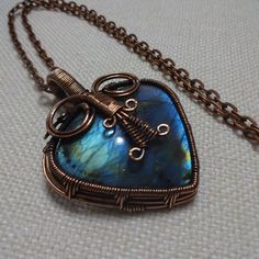 Gorgeous Labradorite Heart Handmade Copper Wire-Wrapped Pendant On A 18" Chain #848b All Of My Jewelry Is Handmade By Me In My Smoke & Pet Free Home!!!!!! Please Note That Every Item Purchased Comes In A Drawstring Organza Bag For Easy Gift Giving!!! Please Note That I Will Consider Any Reasonable Offer On My Jewelry!!!!!!!!!! Please Let Me Know If You Have Any Further Questions. Thanks For Stopping By And Have A Terrific Day!!!! Wire Wrapped Crown, Wire Weaving Patterns, Jewelry Tutorials Free, Red Crystal Necklace, Heart Stones, Valentines Day Jewelry, Wire Wrapped Stone Jewelry, Wire Wrap Jewelry Designs, Wire Wrapped Jewelry Tutorials