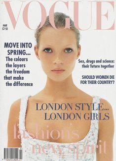 a magazine cover with a woman wearing a white dress