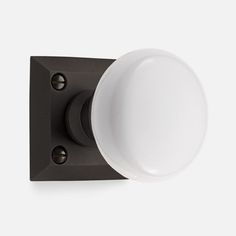 an image of a white light on a black and silver wall mounted fixture with dimmer