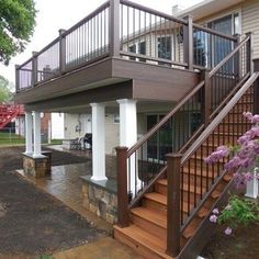 an outside view of a house with stairs