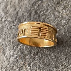 Gorgeous In 14kt Gold !! Handcrafted Navajo Native American Storyteller Ring With Many Images Including A Hogan Dwelling, Animals And Others Images Depicting Everyday Life And The Stories And Traditions That The Native Americans Lived. Beautiful Details. A Treasure To Add To Your Native Collection Size 8 1/2 Weight 6 Grams Approximately Stamped 14 K Band Measures 3/8 Inch Width Condition New Never Worn From Vintage 80’s Collection 14k Gold Ceremonial Ring Jewelry, Ceremonial 14k Gold Ring Jewelry, 14k Gold Ceremonial Ring, Ceremonial 14k Gold Ring, Traditional 14k Stamped Ceremonial Jewelry, Traditional Ceremonial 14k Stamped Jewelry, Traditional 14k Stamped Ring, Ceremonial 14k Gold Engraved Ring, Heirloom 14k Stamped Ceremonial Jewelry