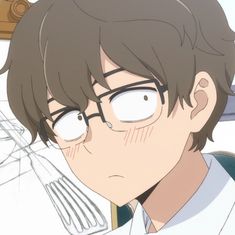 an anime character with glasses staring at the camera