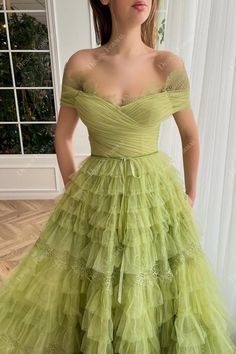 Lime Green Off-shoulder Pleated Luxury Ruffled Tulle Custom Bridal Prom Evening Gown features pleated fitted bodice with scalloped lace trimmed sweetheart neck, open V-back, A-line skirt with court train covered in luxury tiered ruffles. shown color: lime green bra support: with cups boning: yes closure: back zipper lining: fully lined Tea Length Prom Dress, Gown Silhouette, Hot Prom Dress, Green Homecoming Dresses, Green Tulle, Homecoming Dresses Tight, Prom Dresses For Sale, Princess Gown, Ribbon Belt